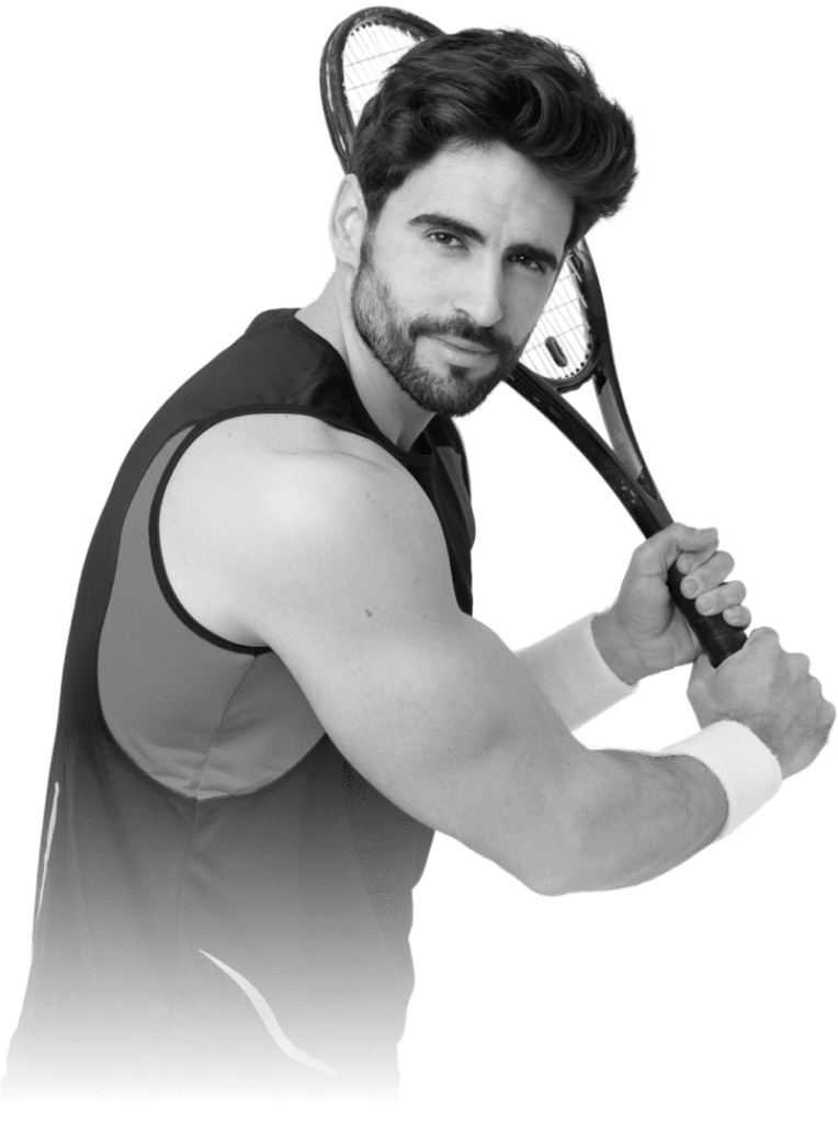 Man holding tennis racket, athletic pose.